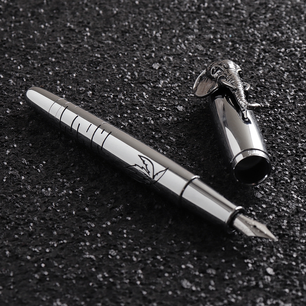 

Fuliwen Silver Medium Nib Fountain Pen With Elephant Head on the Cap Vintage Style Writing Pen